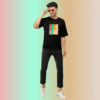 Full outfit view of model wearing Joe Vogue black oversized multicolor brushstroke T-shirt