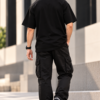 Joe Vogue Oversized T-Shirt Back View Back view of model wearing a plain black oversized T-shirt
